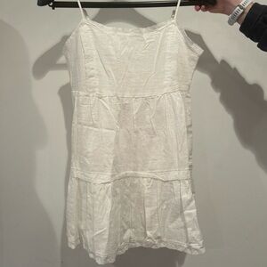 White Strappy dress.  New without tags.  Buttons at the neck in the back